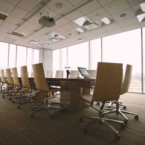 Conference room chairs on commercial carpet